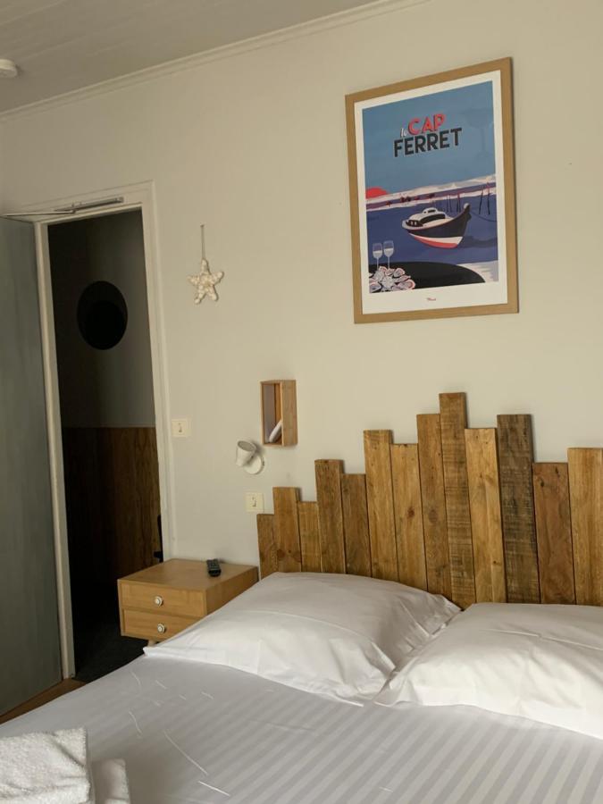 Hotel La Petite Auberge Арес Екстериор снимка